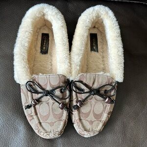 Coach shearling slippers.